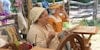 My Life as a Revolutionary War Reenactor Demonstrating How to Spin Yarn Image