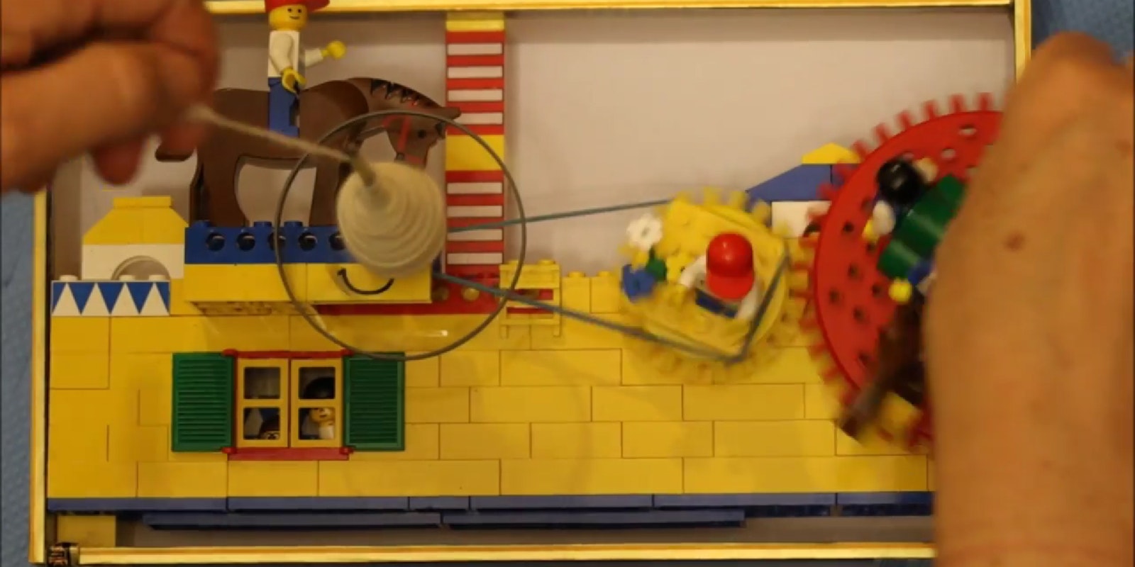 A Spinning Charkha Made of Legos Primary Image